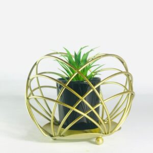Round metal decoration piece with grass